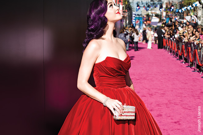 KATY PERRY, 2012 This was shot in Hollywood when Katy’s Part of Me documentary was released. Fans were on a rooftop screaming. She looked up and gave them a smile and a wave. Notice the carpet’s pink, not red. Katy always does things a bit differently.